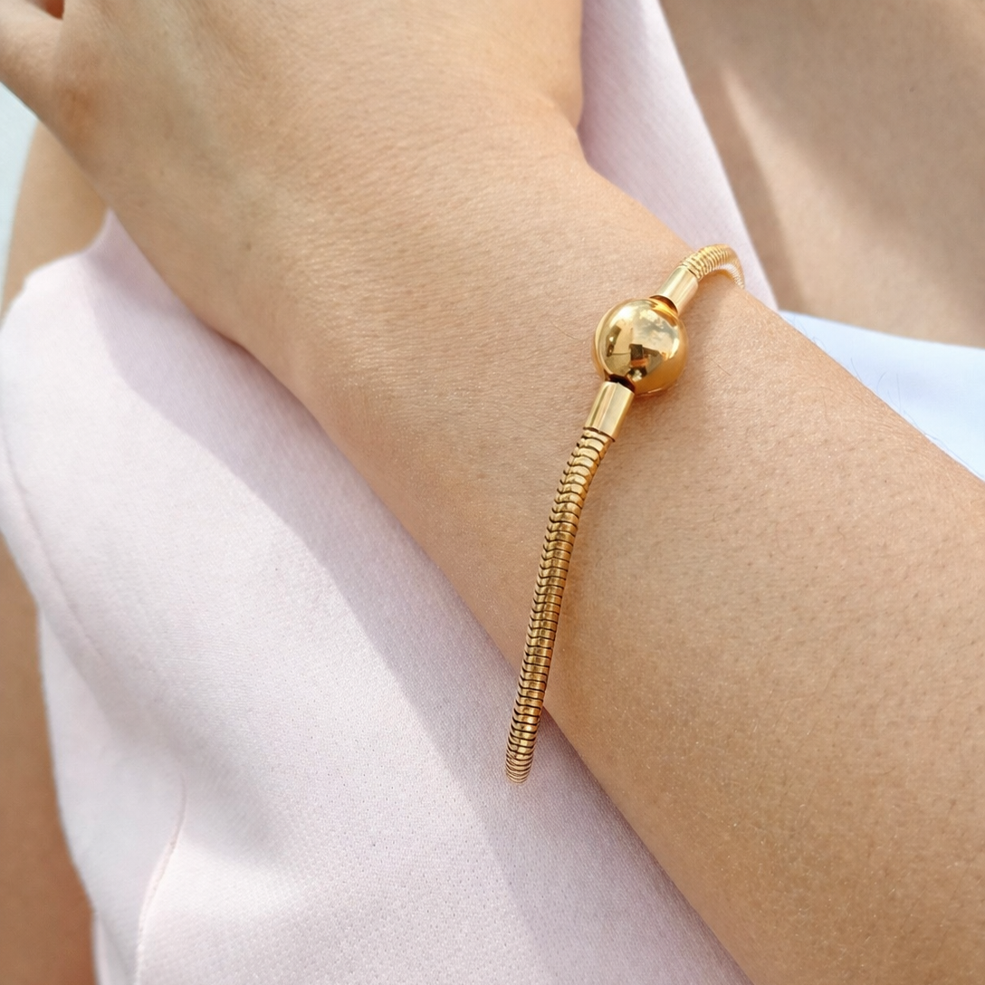 Pulsera tipo pandora de acero de broche de esfera en dorado