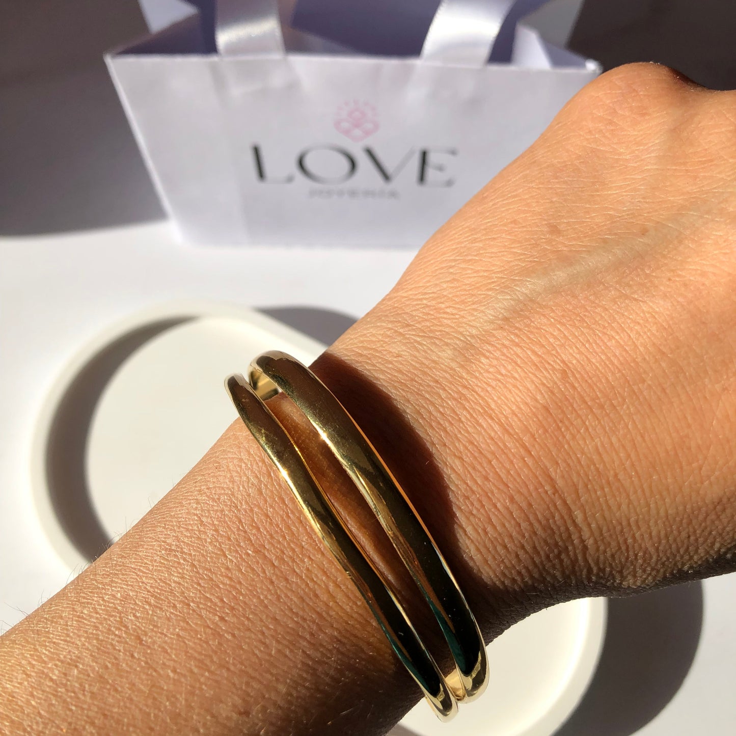 Pulsera doble acero dorada rígida