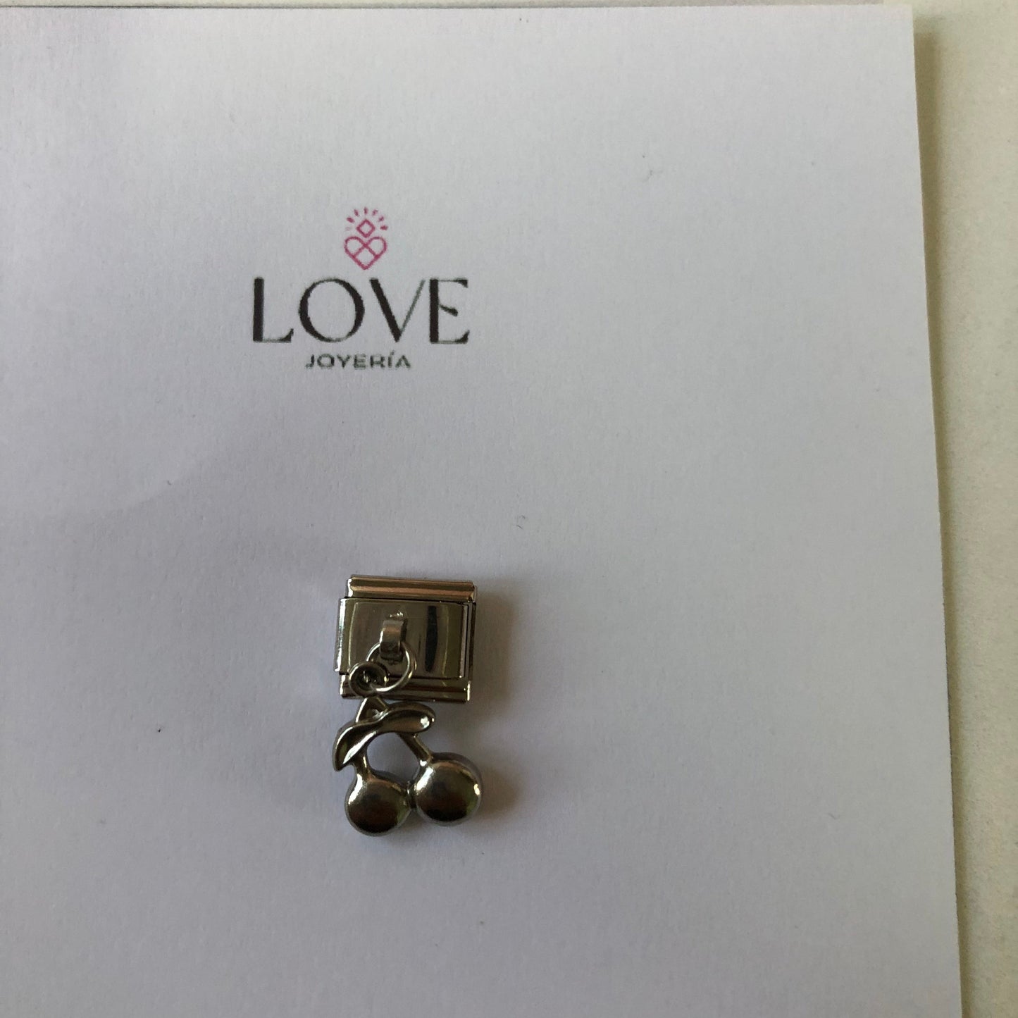 Charm cereza colgante