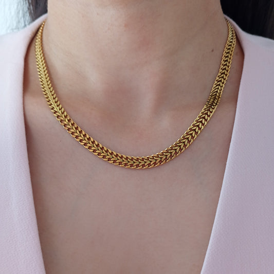 Collar Líra dorado acero