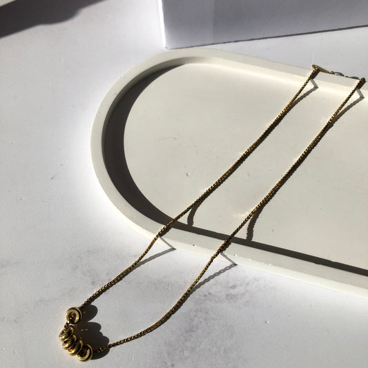 Collar círculos Dorado acero