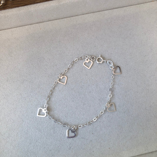 Pulsera corazones plata .925