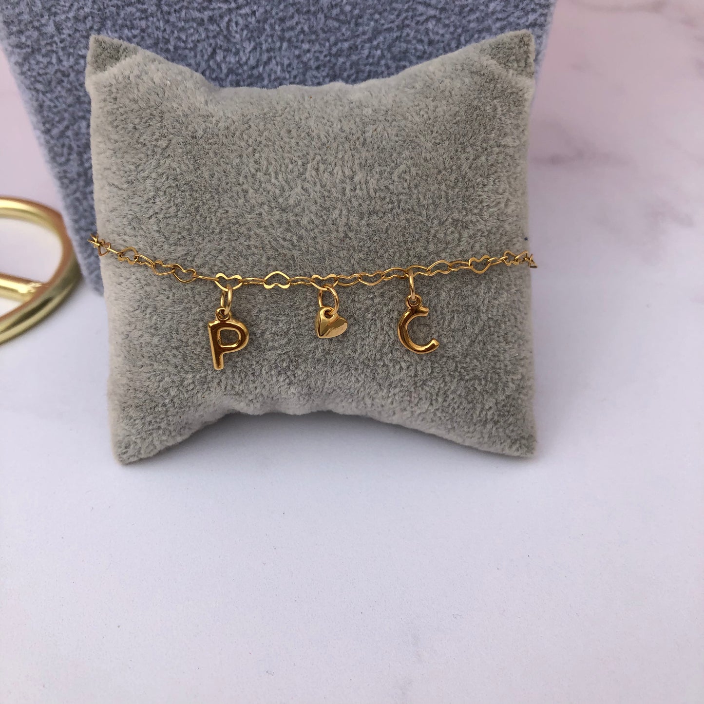 Pulsera iníciales y corazón