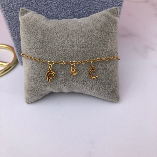 Pulsera iníciales y corazón