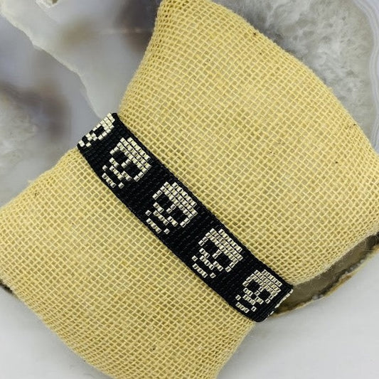 Pulsera Miyuki Negra Calaveras